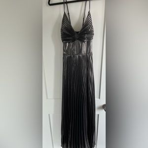 Gunmetal black, full-length accordion dress.